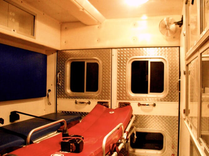 Two metal doors as seen from the inside of the back of an ambulance