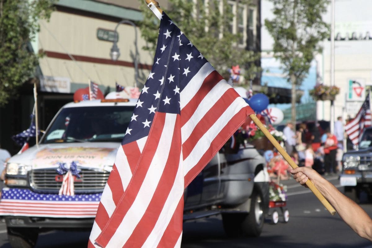 An American flag carried along the parade route